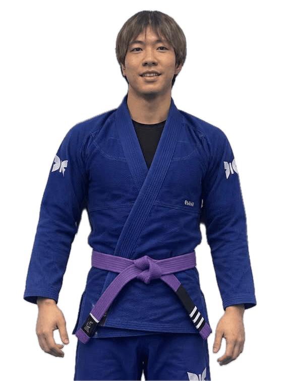 Yoshi Hirokawa in a blue gi, purple belt